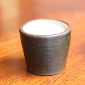 Petite bougie en cire de soja parfum abricot-romarin, pot en céramique Duchastel