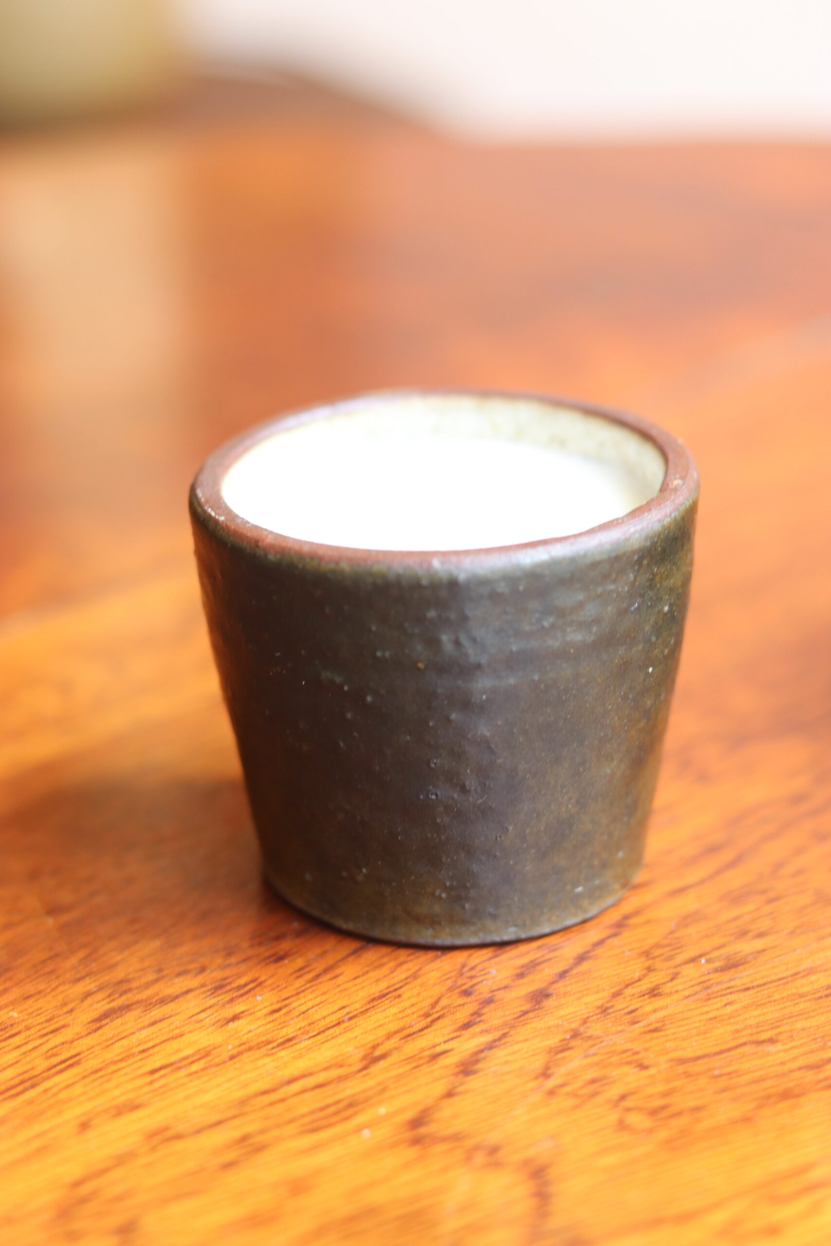 Petite bougie en cire de soja parfum abricot-romarin, pot en céramique Duchastel