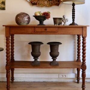 Grande console ou desserte de magasin en pitchpin, début XXème