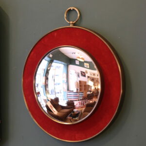 Miroir œil de sorcière en laiton et velours rouge